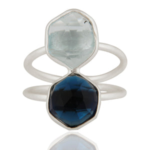 Anillo de plata con corundum y topacio azules